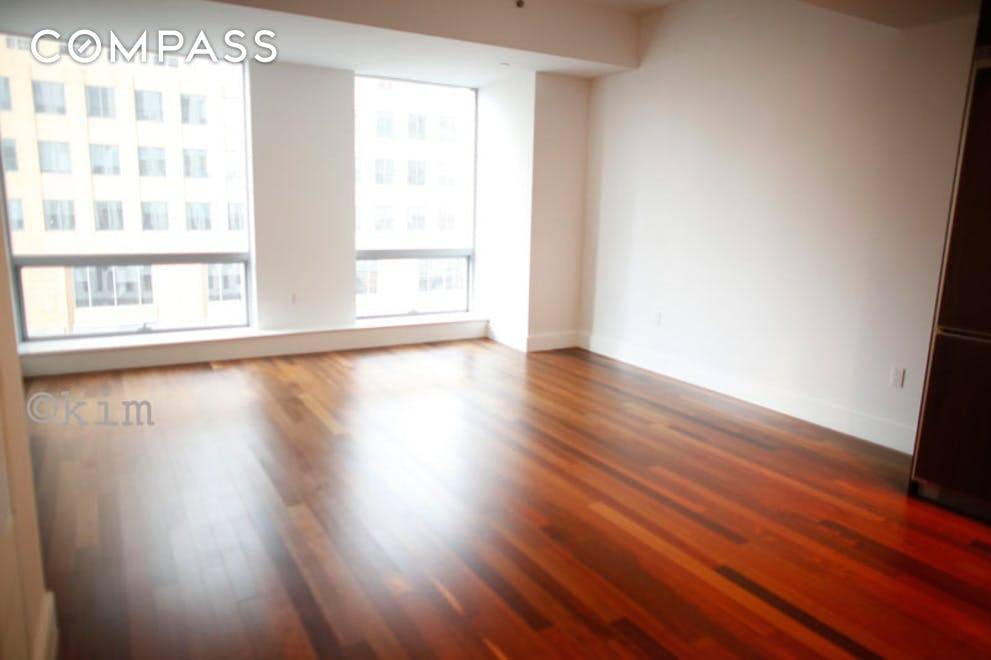 Apt features panoramic views with floor to ceiling windows.