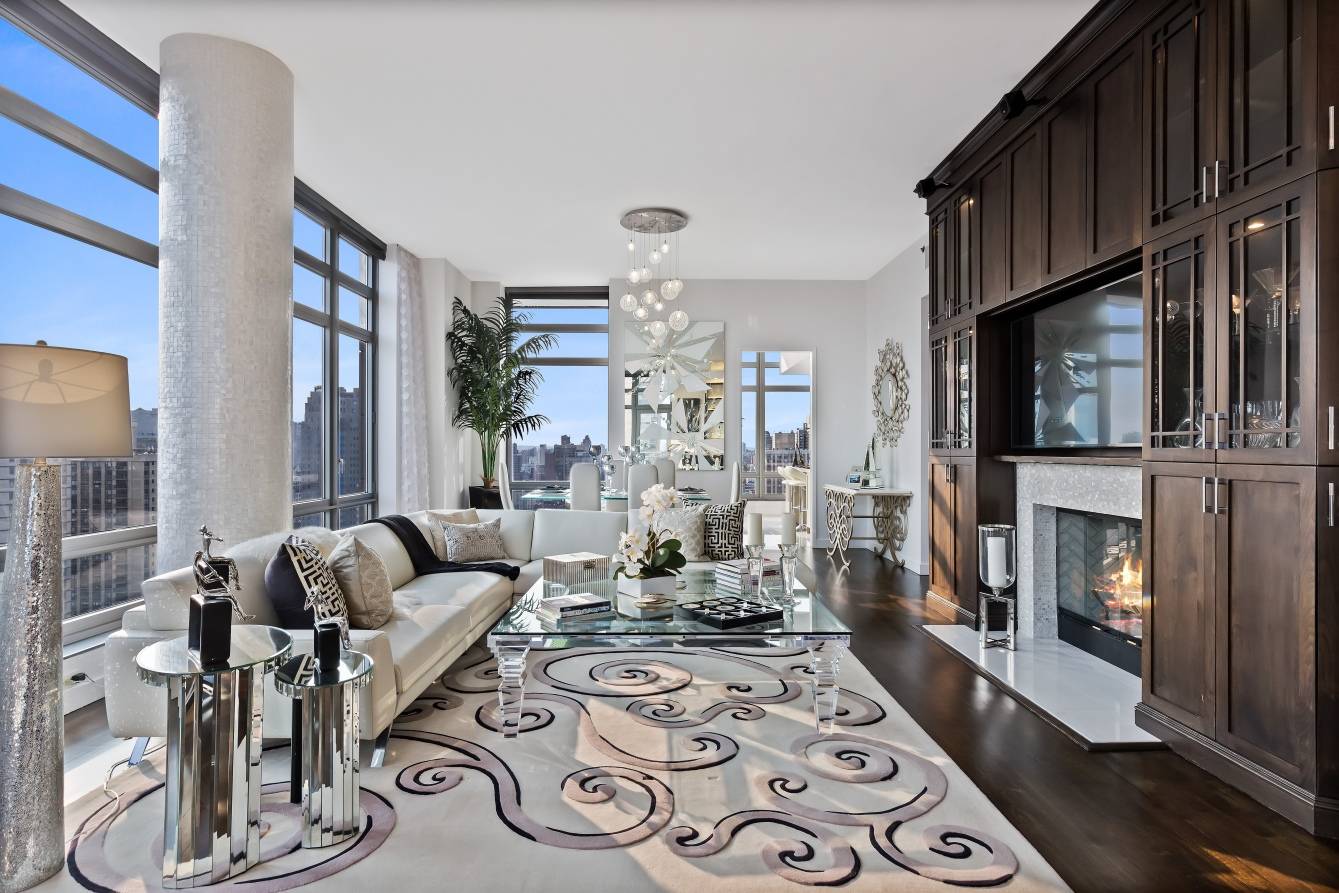 Oasis Over Manhattan... Bask in the breathtaking panoramic views from every corner of this luxury Penthouse !