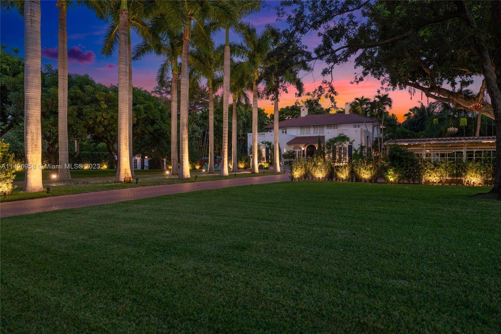 Rare chance to own a 1. 5 acre estate with complete privacy, two gated entrances, and a walled in lot.