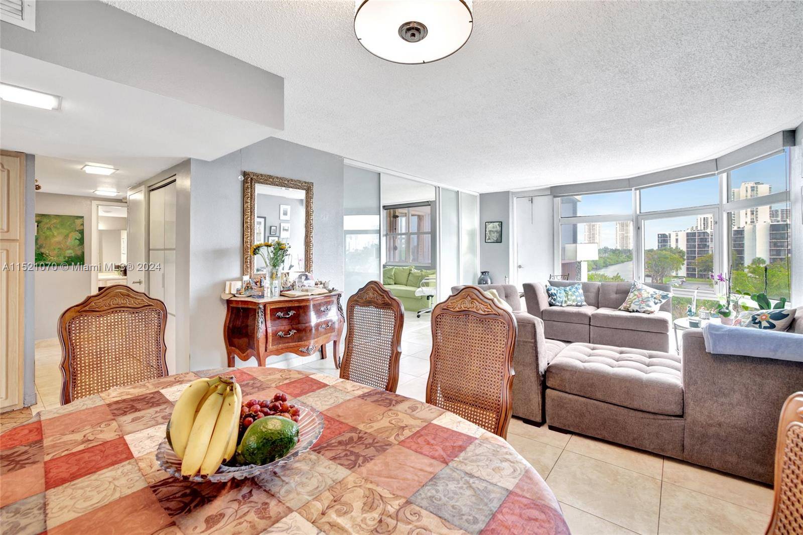 Live in a prime Aventura location on The Circle, a 3 mile exercise path circling the Turnberry Golf Course.