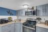 Gorgeous quartz countertops stainless steel appliances first floor kitchen