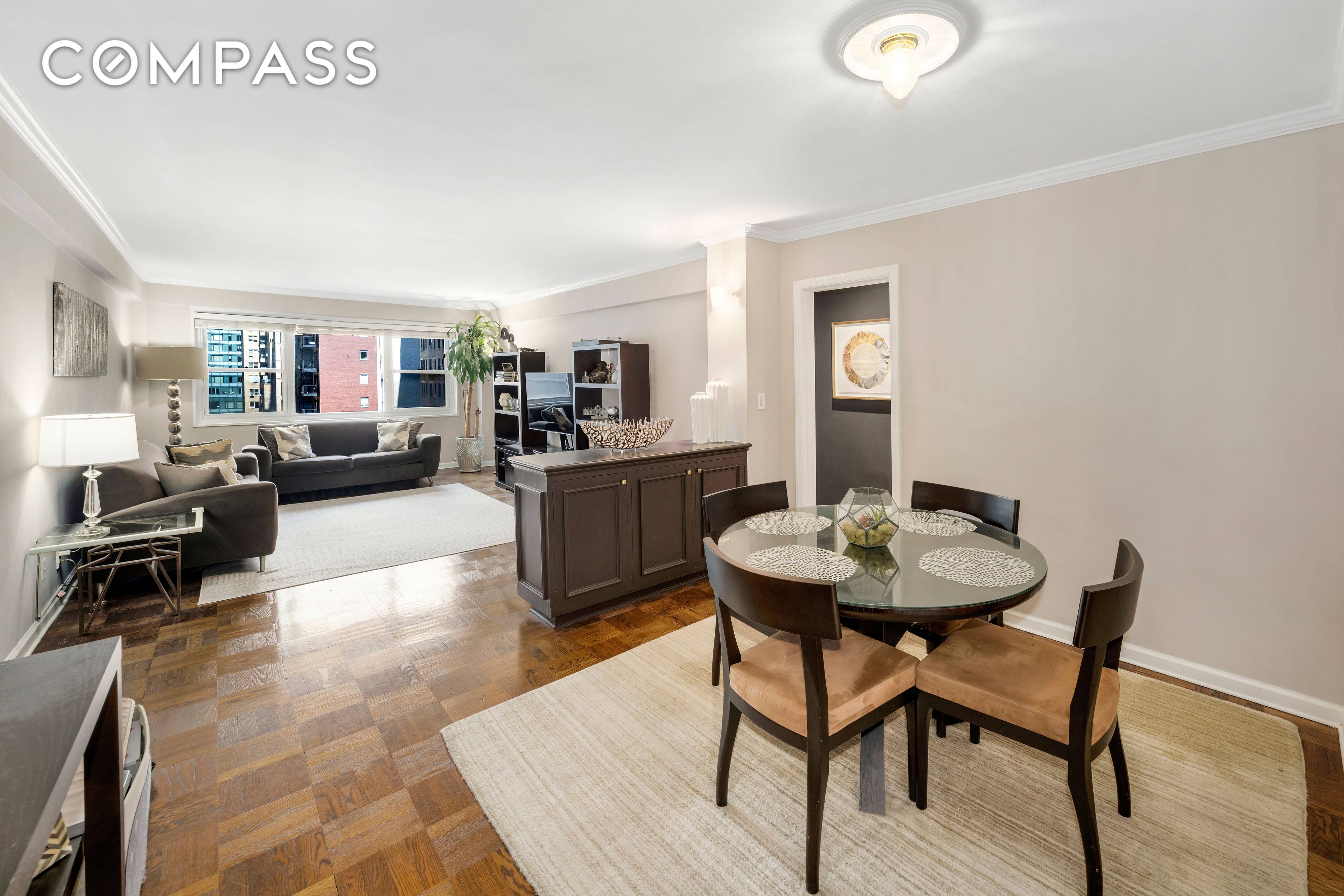 Welcome to 345 East 56th Street, Unit 11C, a vibrant gem nestled in the heart of New York City.