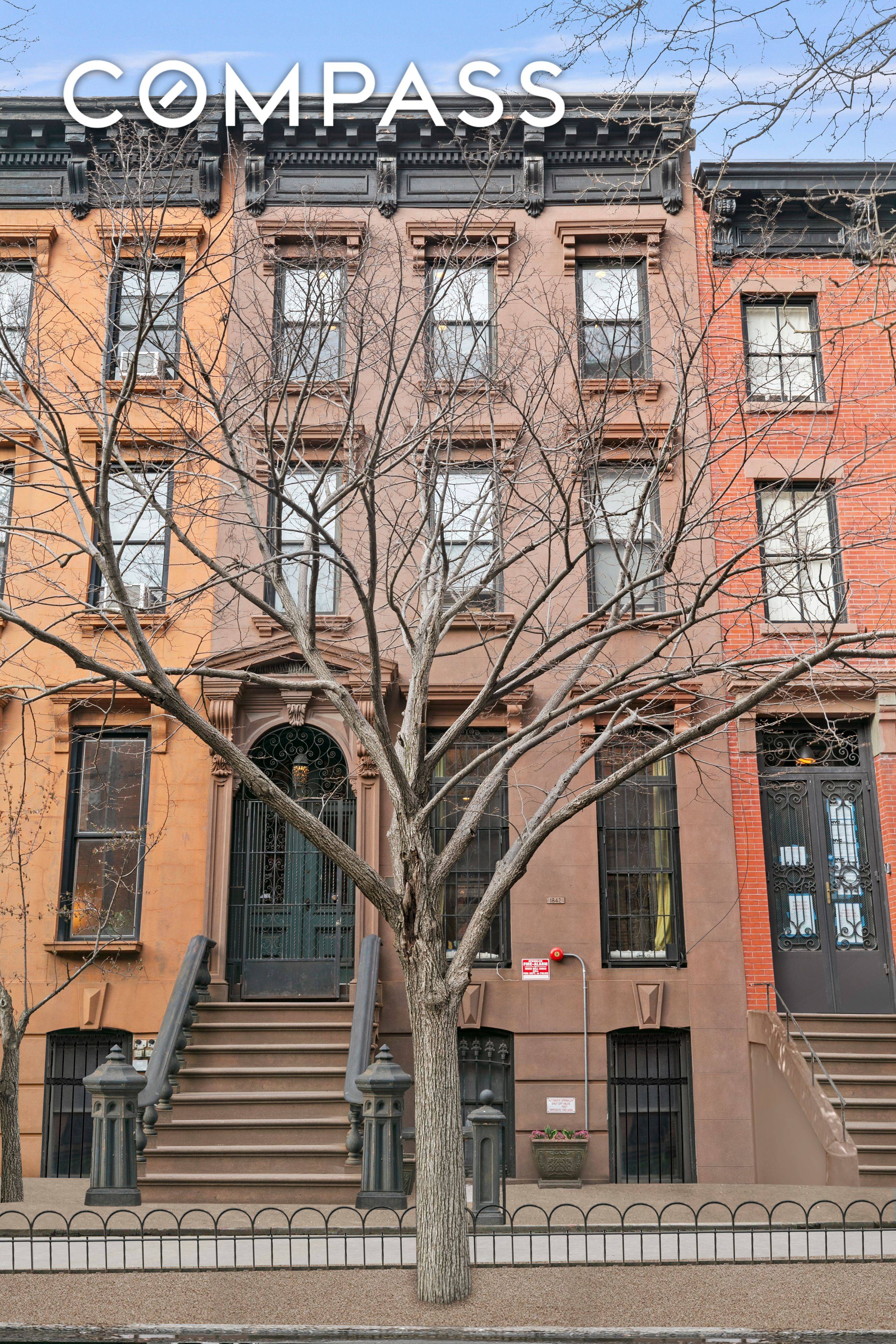 Grand scale four story brownstone of charm and flexibility.