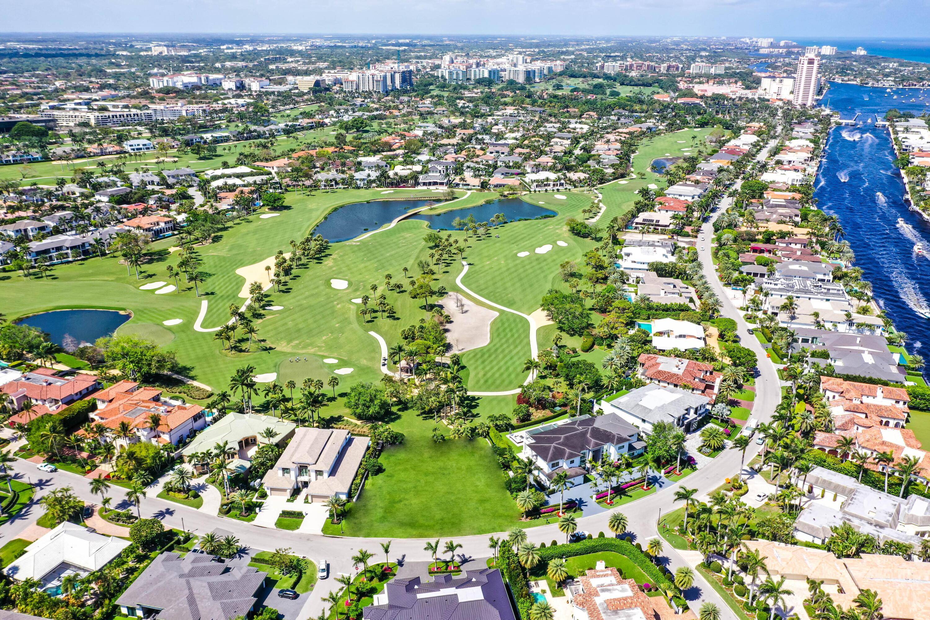 Once in a lifetime lot, almost a half acre on the golf course in Royal Palm Yacht and Country Club 180 ft of frontage Very private yet long range magnificent ...