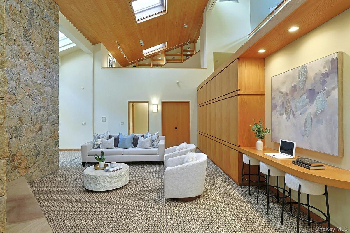 Architectural details and exceptional craftsmanship showcased in these clean lined built-ins define this one-of-a-kind contemporary residence. Full ba