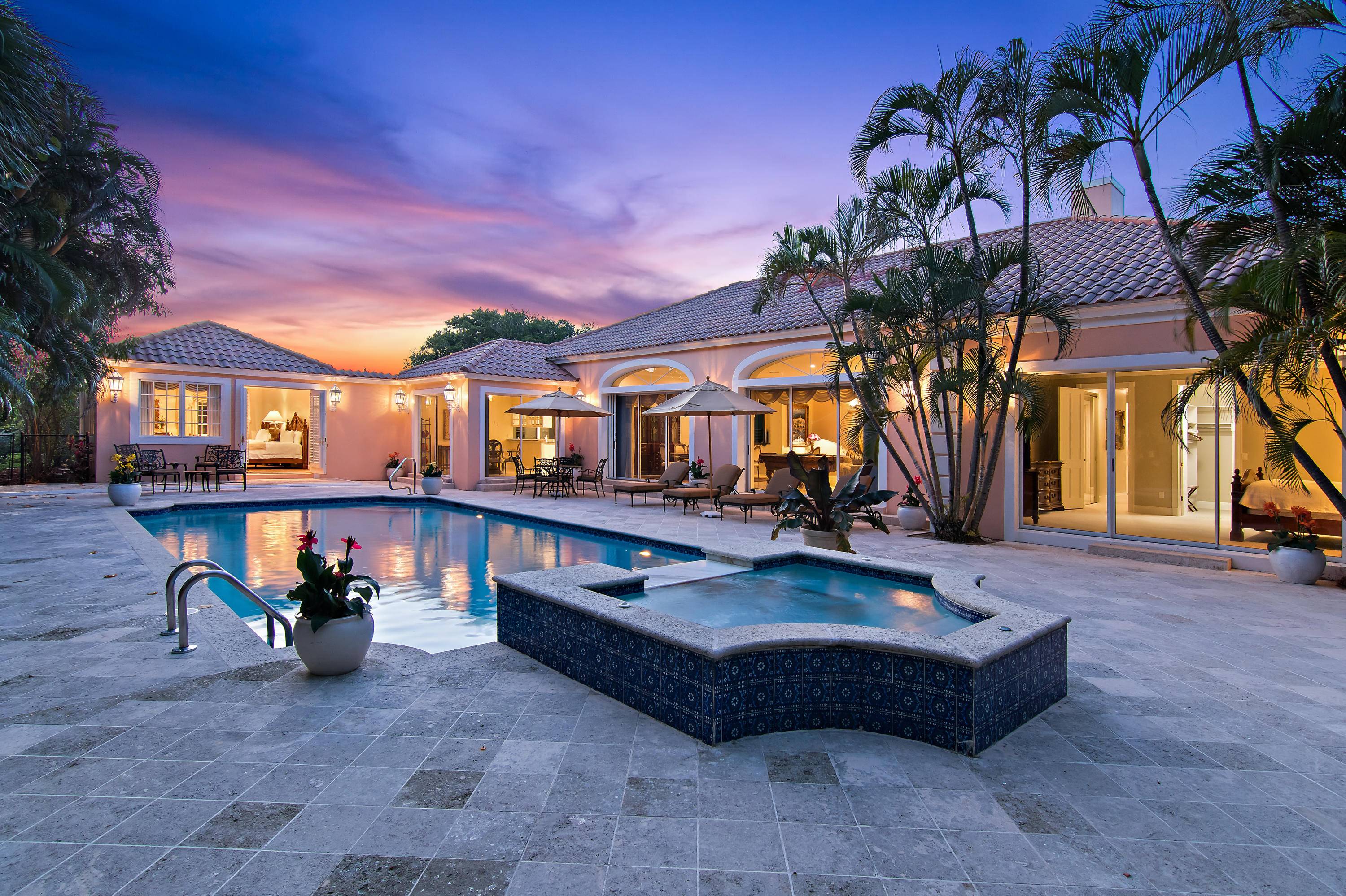 Stunning Palm Beach home located adjacent to the exclusive Mar A Lago Club.