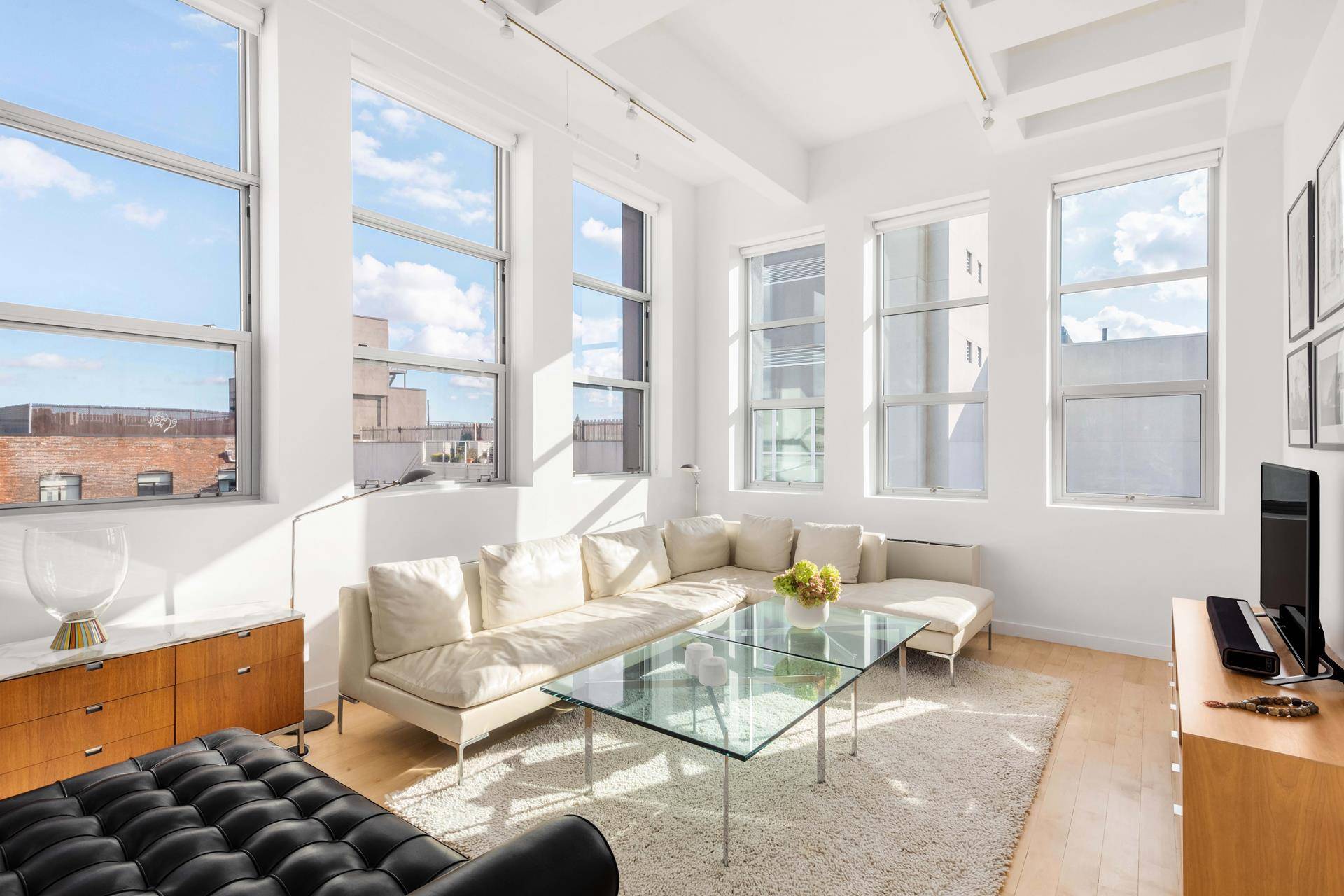 Call this true Williamsburg top floor loft with massive private roof deck home and entertain all of your friends.