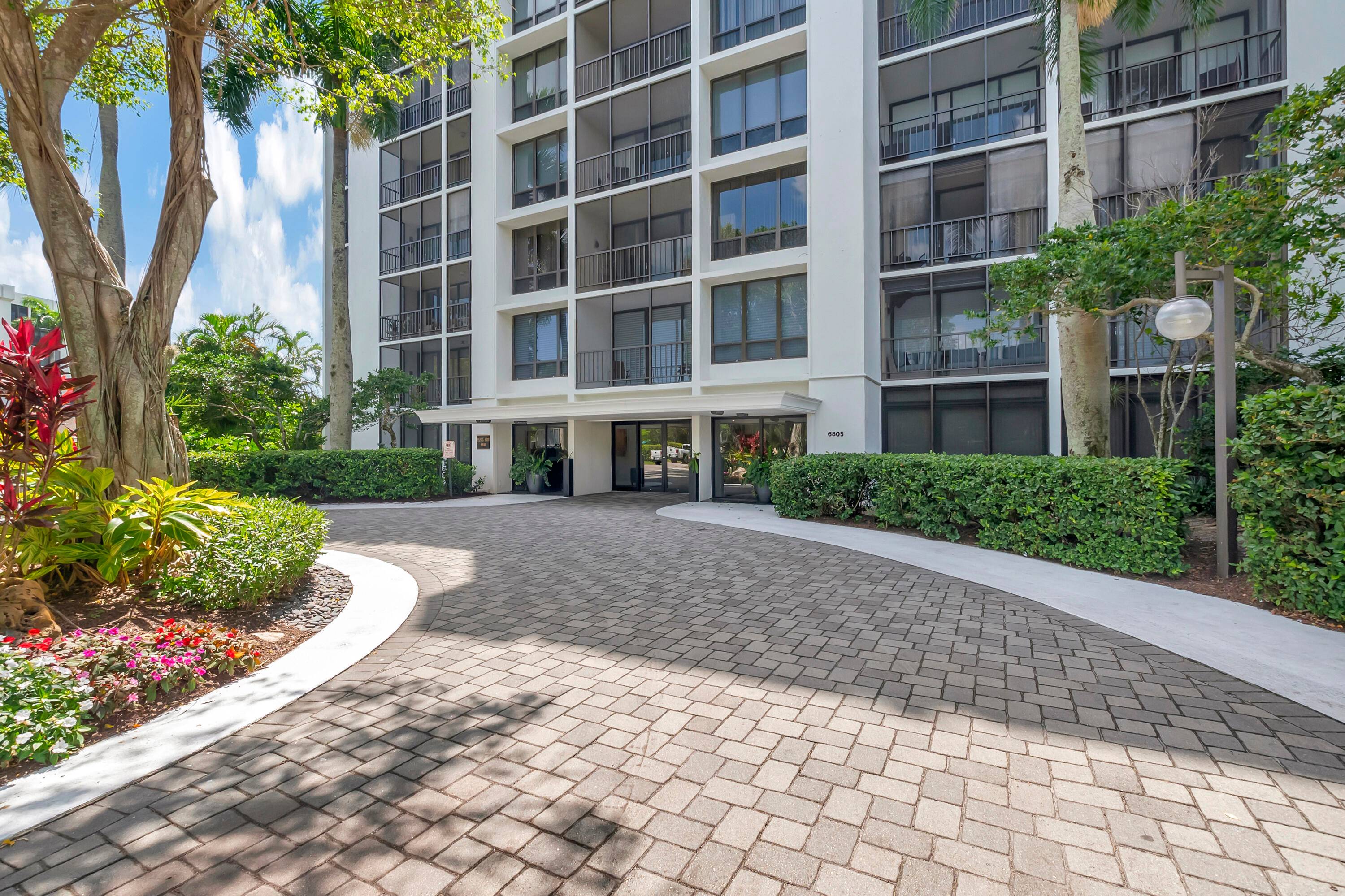 Beautifully renovated and fully updated ground floor condo with light and bright golf course views from every window.
