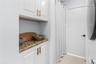 Butler Pantry with Pantry hidden behind curtain