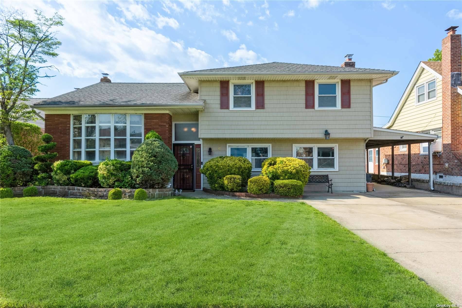 Stop the search amp ; welcome home to this breathtaking three bedroom split level home.