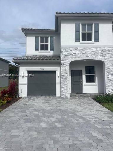 NEW CONSTRUCTION ! Your dream home in Coral Springs.