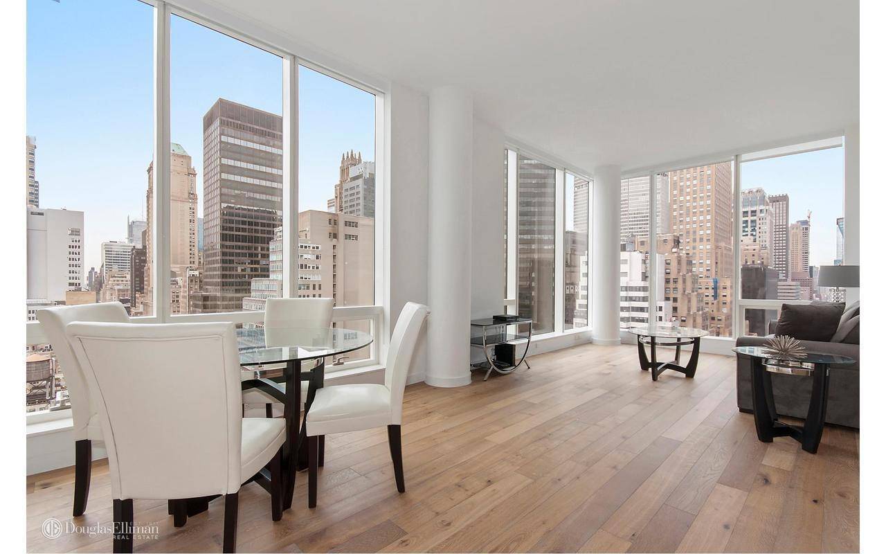 Breathtaking views of the Empire State amp ; Chrysler Building from this South, West amp ; North exposure apartment.