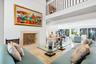 Living room features a wood burning fireplace