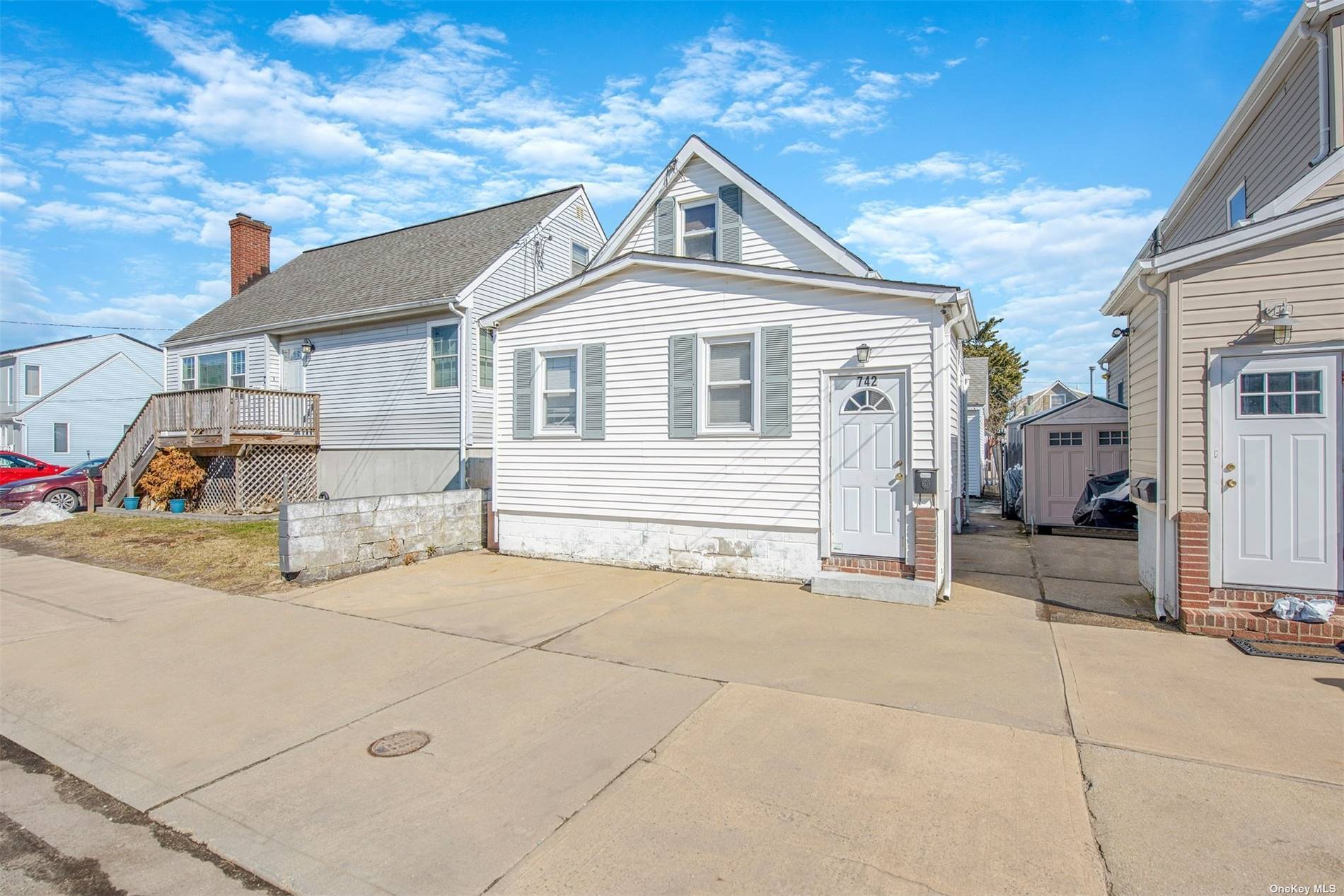 Discover waterfront living at its finest with this exceptional two family home, perfectly situated minutes from the Great South Bay and all that Lindenhurst has to offer.