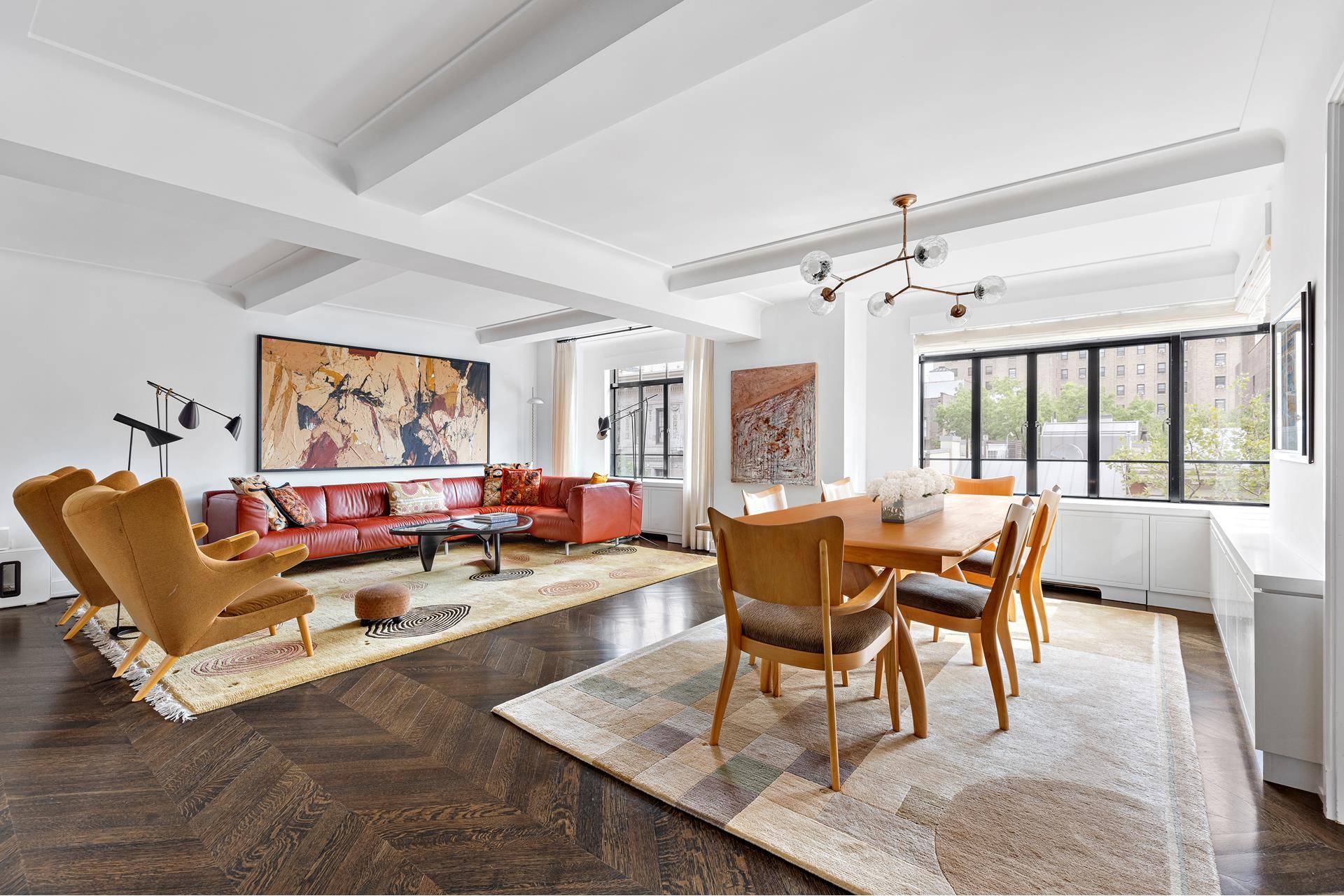 Step into a pre war residence that feels like home in this quadruple exposure, dual wing four bedroom in the esteemed Greenwich Lane complex in Greenwich Village.