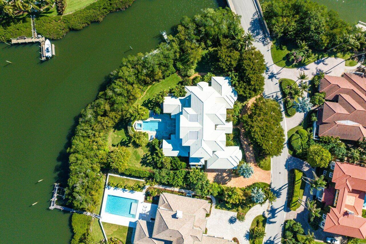 Discover this exceptional waterfront property boasting 252 feet of pristine water frontage, offering immediate access to the ocean.