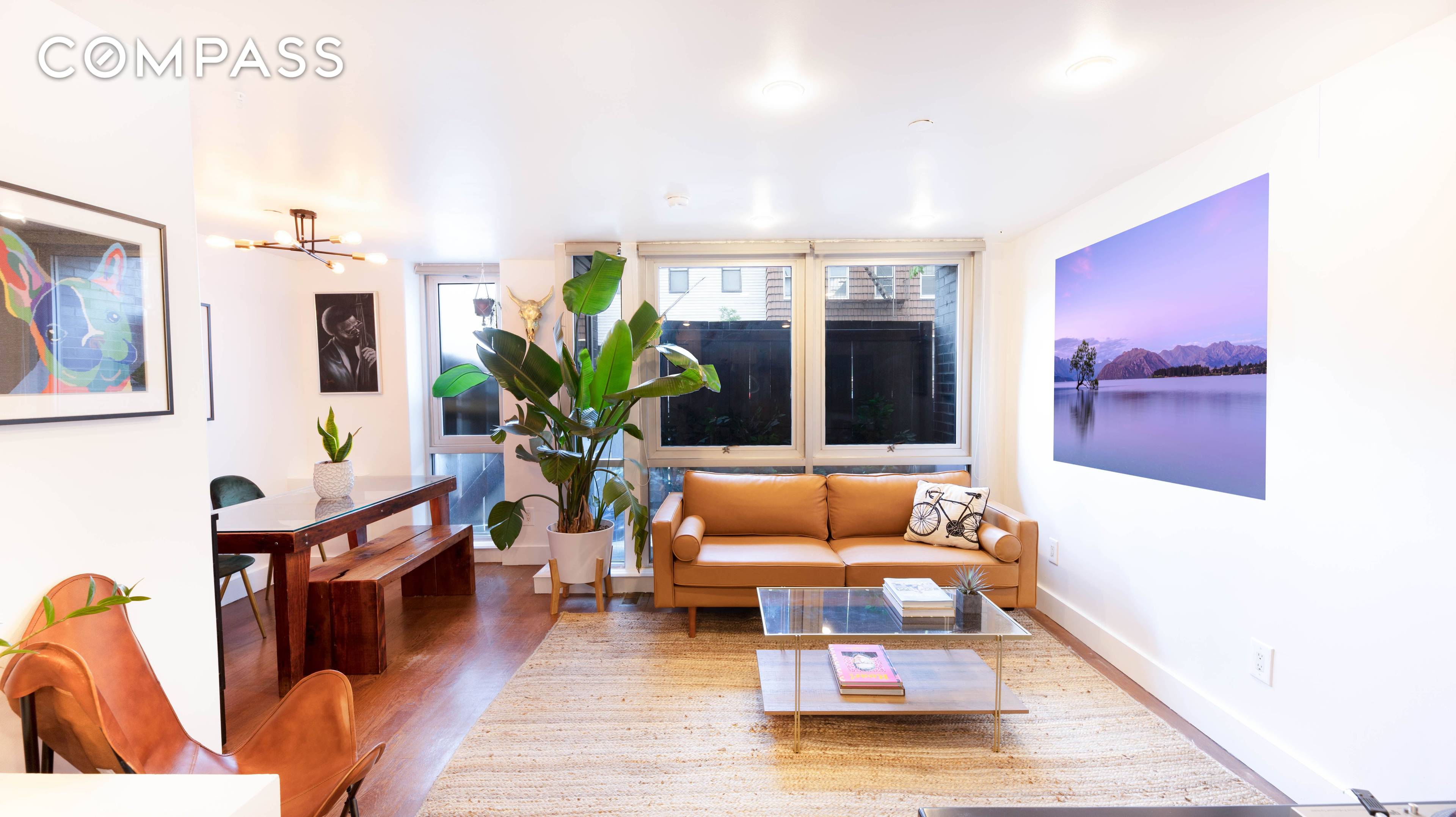 This sunny 1 bed room duplex, with 170 SF of private patio and 97.