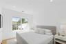 Bedroom featuring wood finished floors and recessed lighting