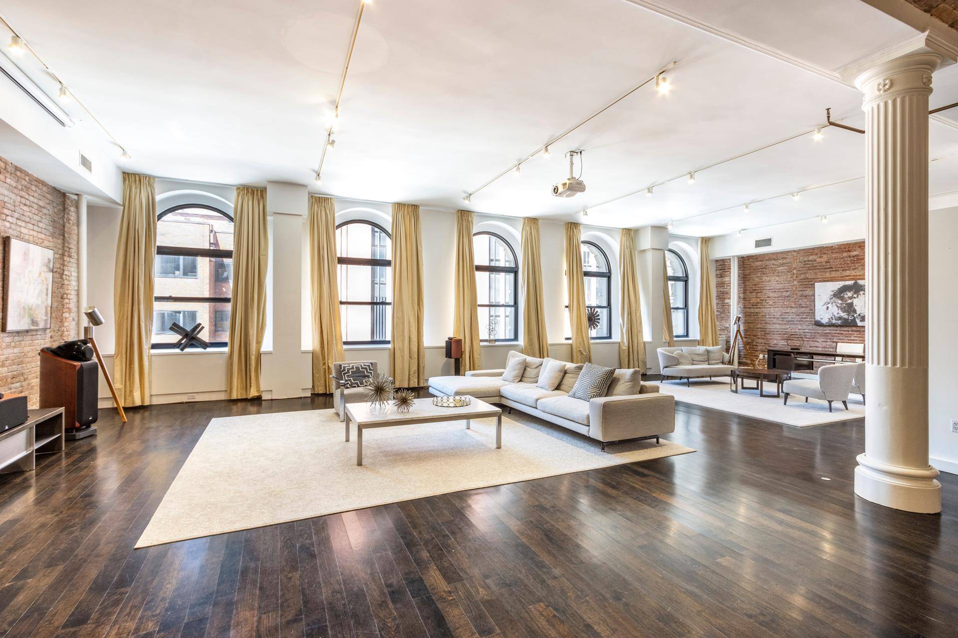 At this unsurpassed location where Noho meets Greenwich Village, this massive 4804SF full floor condominium loft offers extraordinary prewar original details coupled with beautifully renovated and restored interiors.