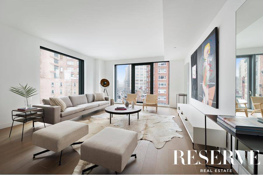 This brand new luxury apartment offers 1, 845 square feet of comfortable living with floor to ceiling windows throughout the unit.
