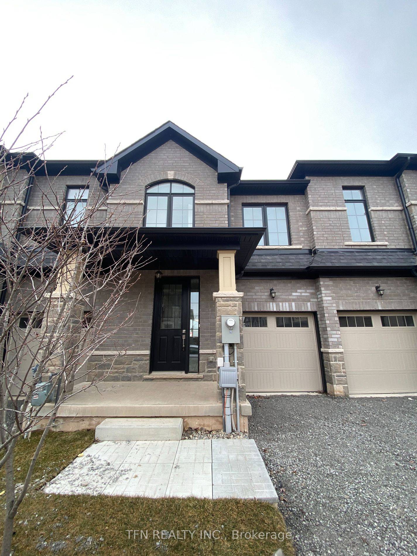 Welcome To This Beautiful Condo Townhome Situated mere moments away from the Falls.