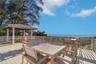 Many options for al fresco dining or relaxing, lounging in the seabreeze on the deck