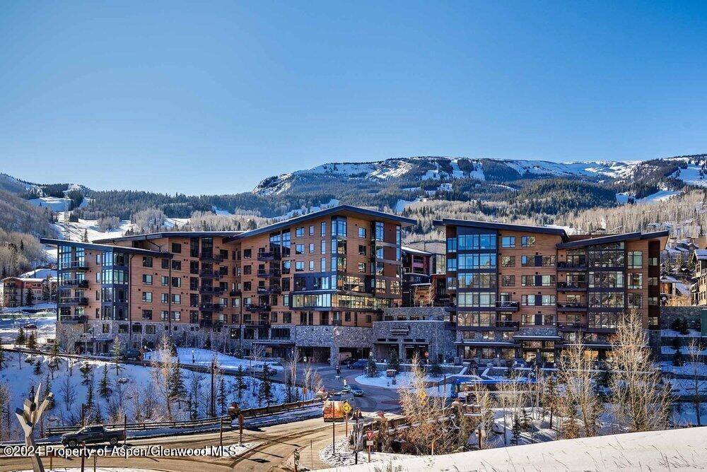 Indulge in the pinnacle of mountain living with this contemporary ski in ski out luxury haven, exquisitely furnished by the renowned interior designer Barclay Butera.