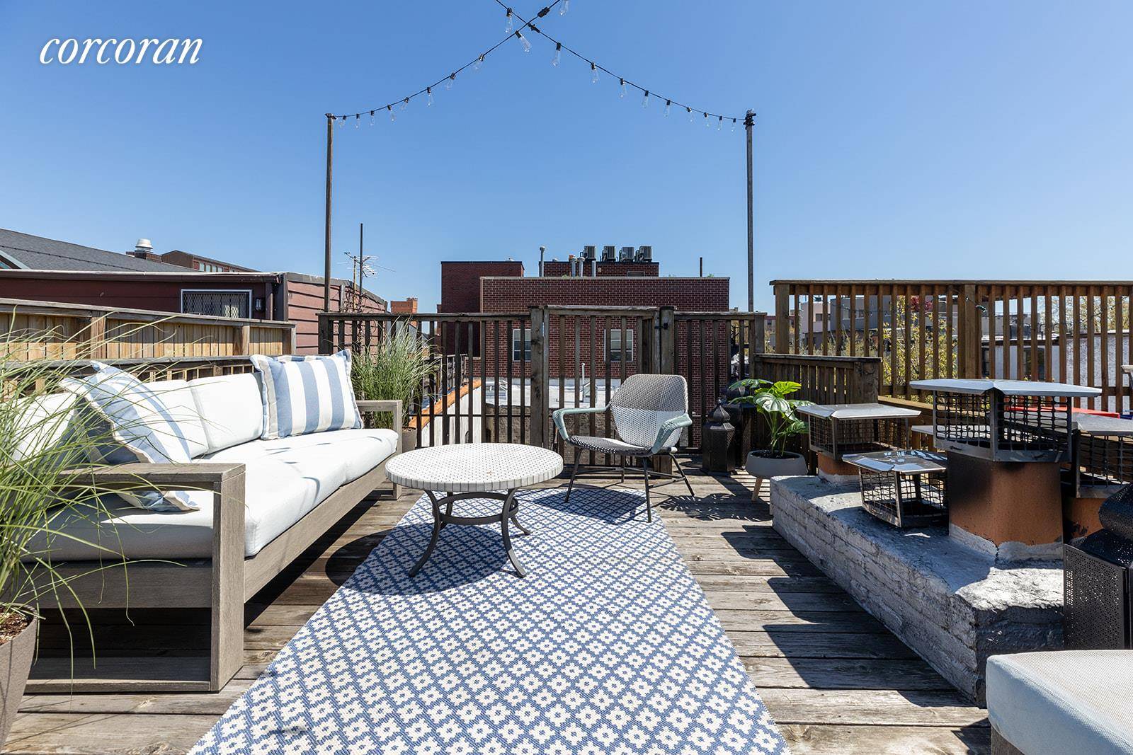 Welcome home to your renovated one bedroom one and half bath duplex apartment with private roof deck, washer dryer, a wood burning fireplace and separate storage space.