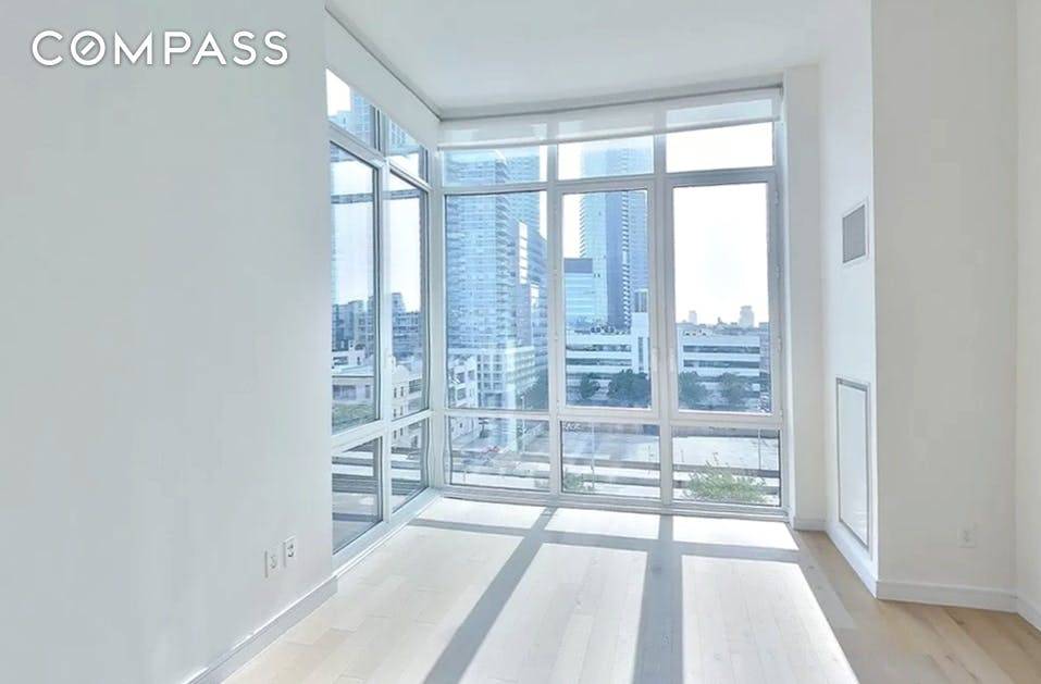 Unit 8E at 1QPS is a bright and sleek south facing corner one bedroom apartment with condo level finishes.