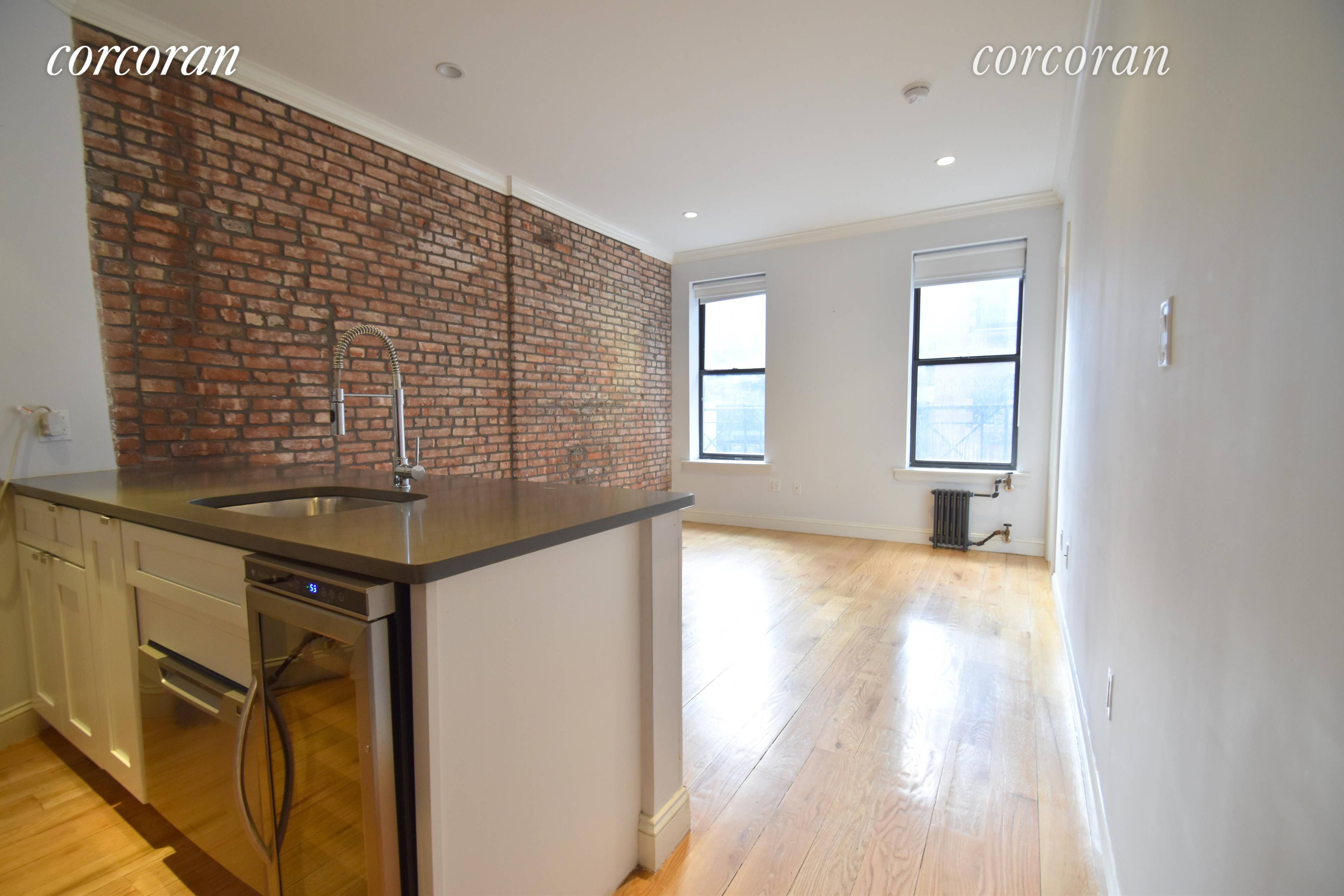 266 ELIZABETH ST NoLita SoHo Great location just off of Prince St, this recently renovated PREWAR apartment features a CHEF'S KITCHEN with white shaker cabinets with concrete gray Caesar stone ...