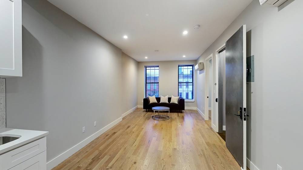Welcome to 234A Vernon Ave, a 20' wide three family brownstone in the heart of Bedford Stuyvesant.