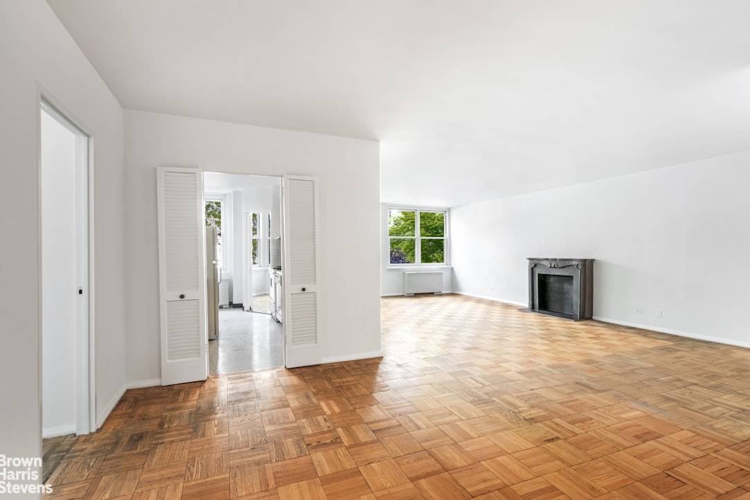Bathed in light with treetop views from every room and through its many windows, this 2BR 2.