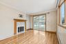 Nice hardwood floors and sliders to the Sunroom/Funroom