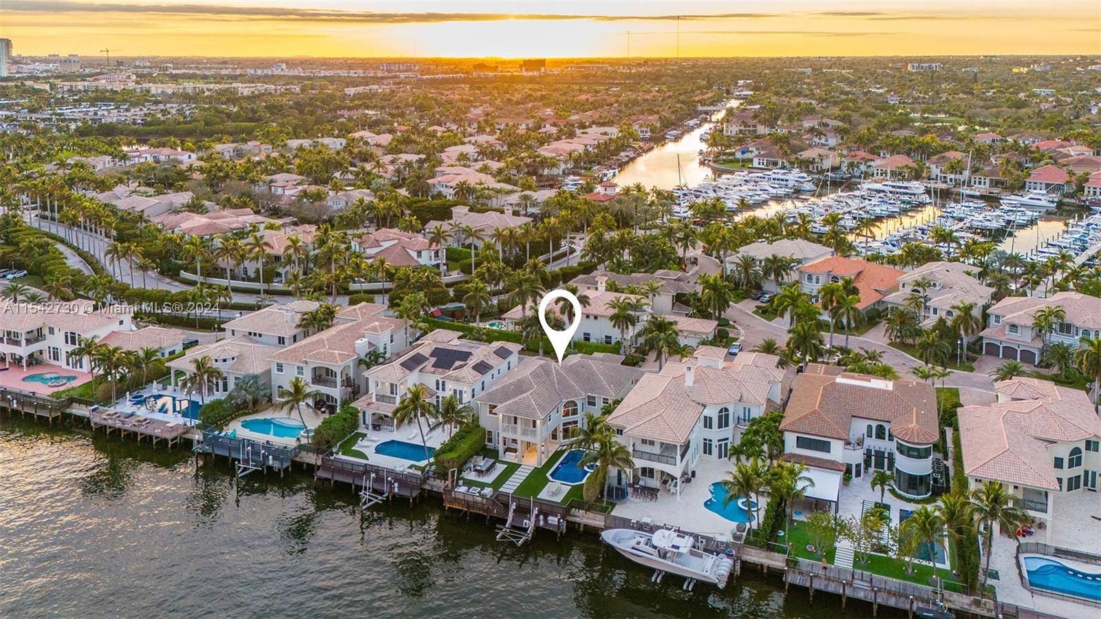 Experience waterfront luxury living in this stunning totally updated turn key estate in the private gated community of Harbor Islands.