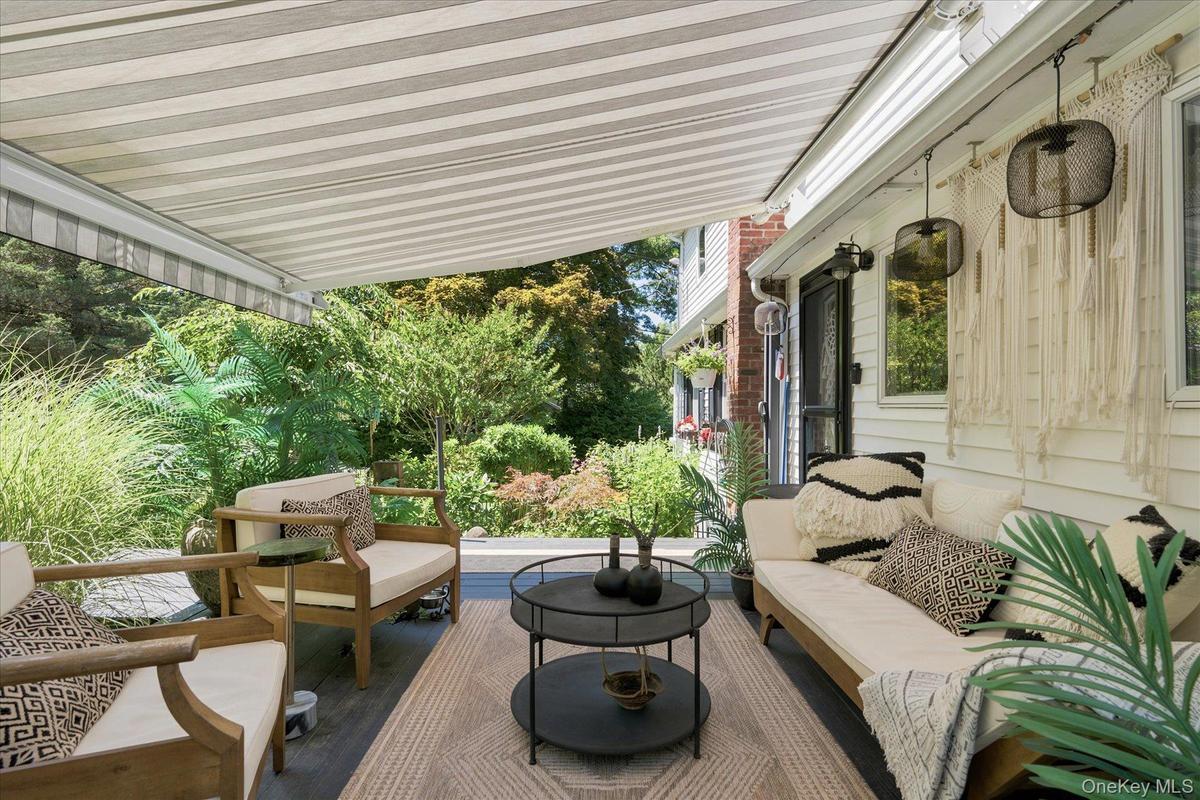 Retractable awning makes your deck like a private courtyard in all seasons and all types of weather