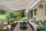 Retractable awning makes your deck like a private courtyard in all seasons and all types of weather
