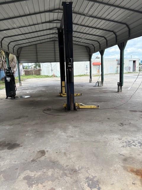 covered carport with lift