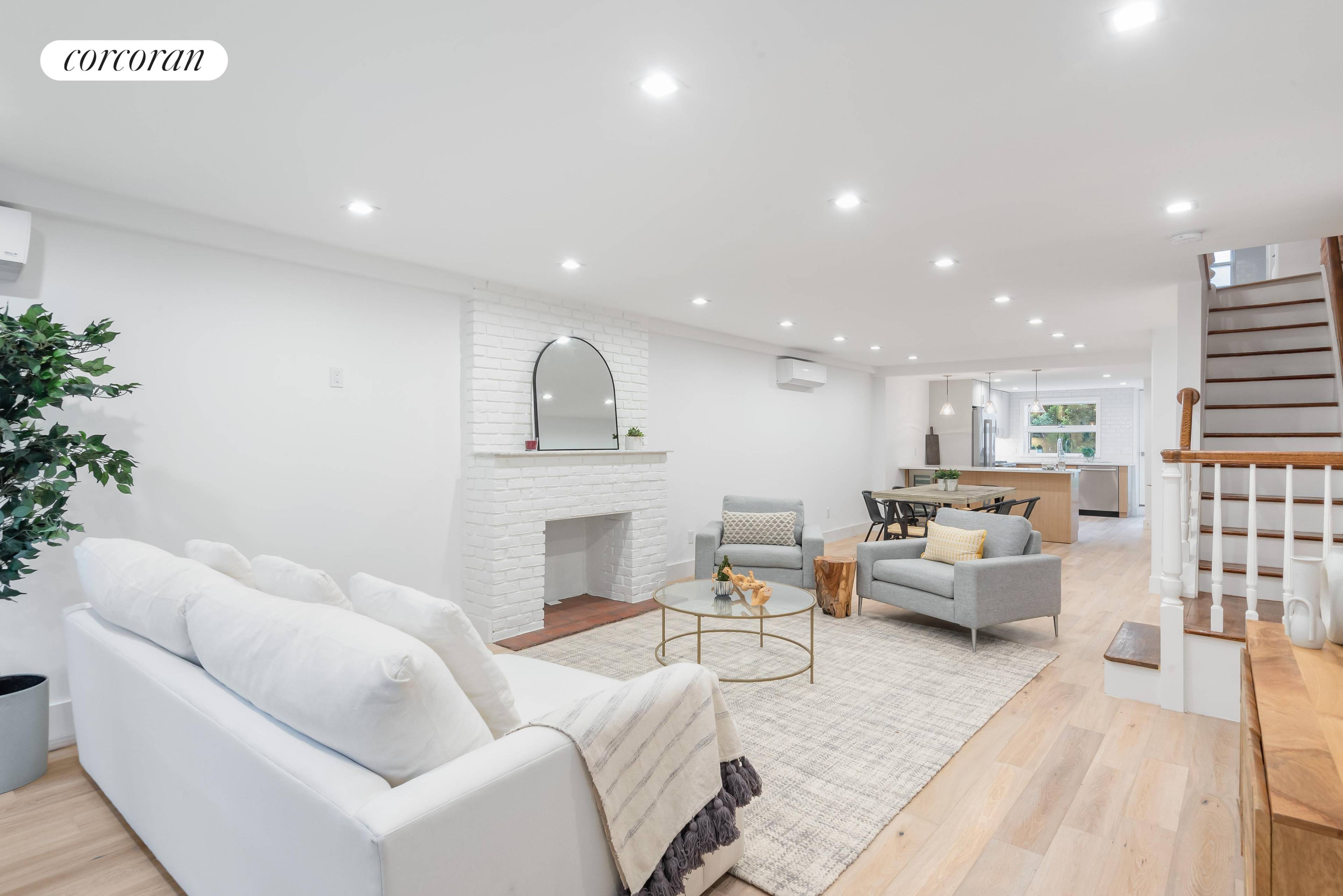 125 2 Place is a stately three unit townhouse in coveted Carroll Gardens, offering a brand new renovation of the owner's duplex.