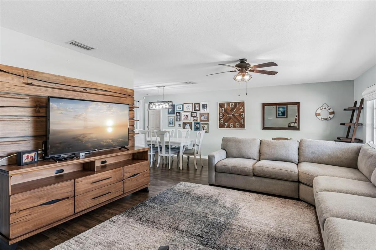 Spacious living room to the right of the foyer