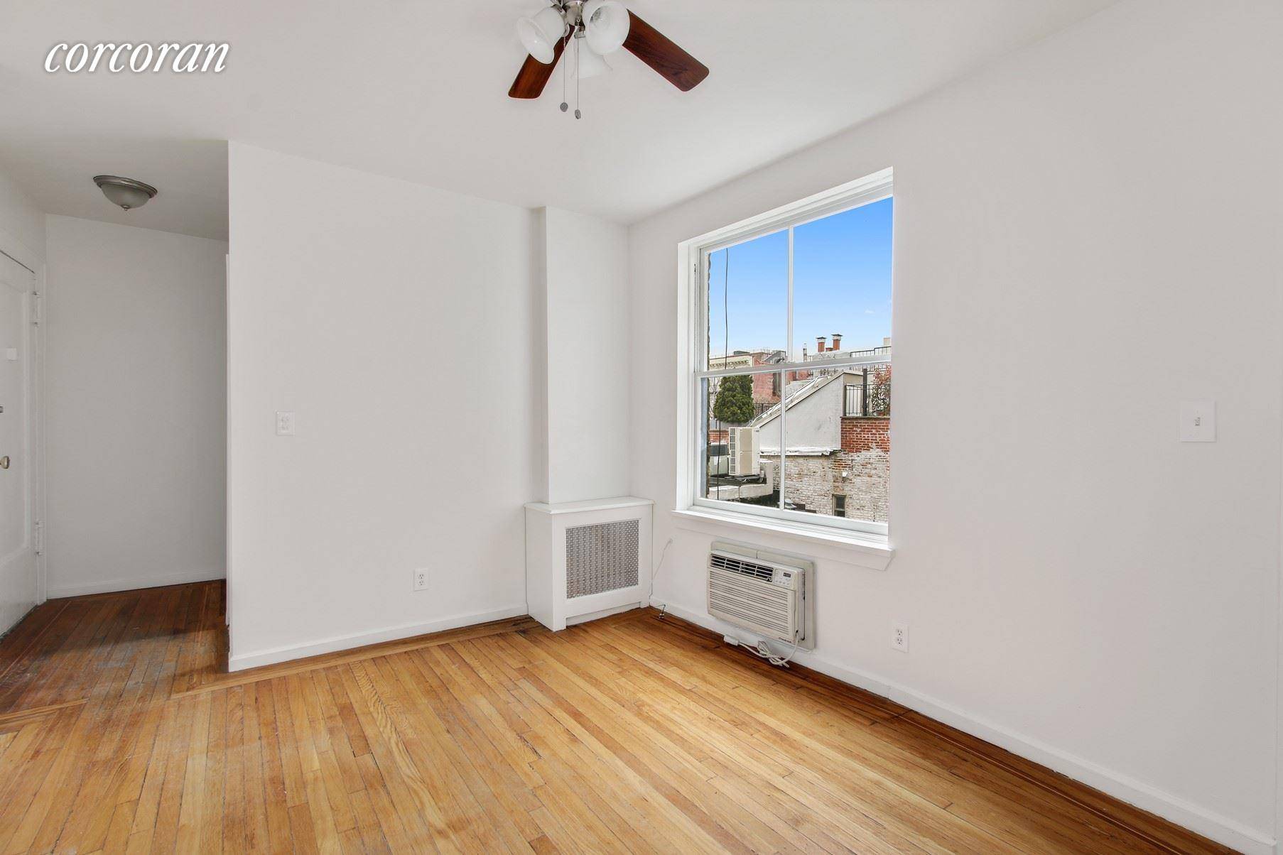 Sun splashed spacious two bedroom on beautiful cobble stoned West 12th Street in the heart of the West Village.