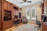 Library/OfHice (15 x 12)2 Maple Desk and built in cabinetry convey with the home Deluxe Pecan Wood Flooring