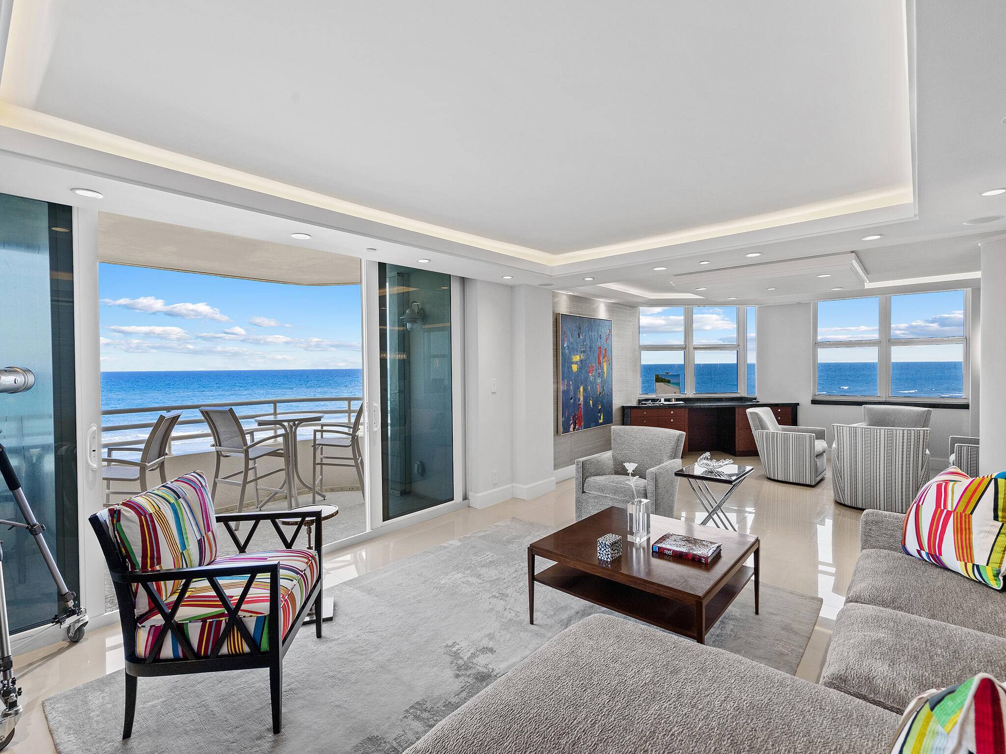See this spacious reimagined, unique oceanfront corner condo with panoramic Ocean views !