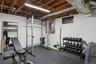 Exercise area featuring rubber floors