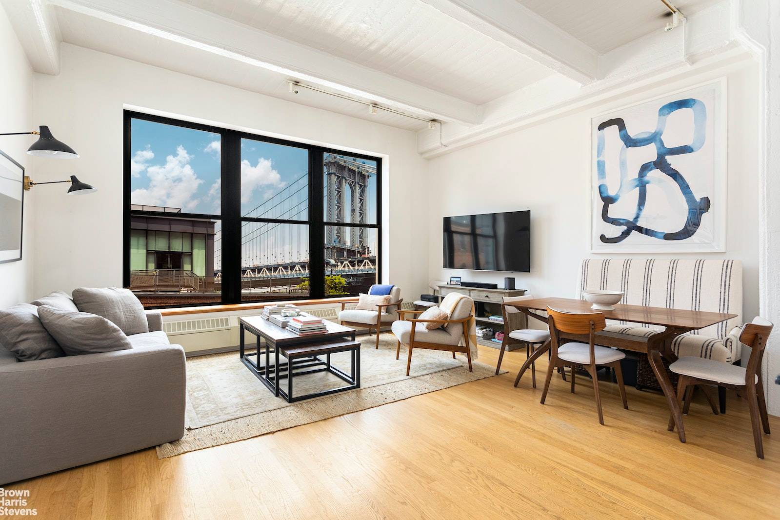 Loft living in the heart of vibrant DUMBO with a spectacular view of the Manhattan Bridge.