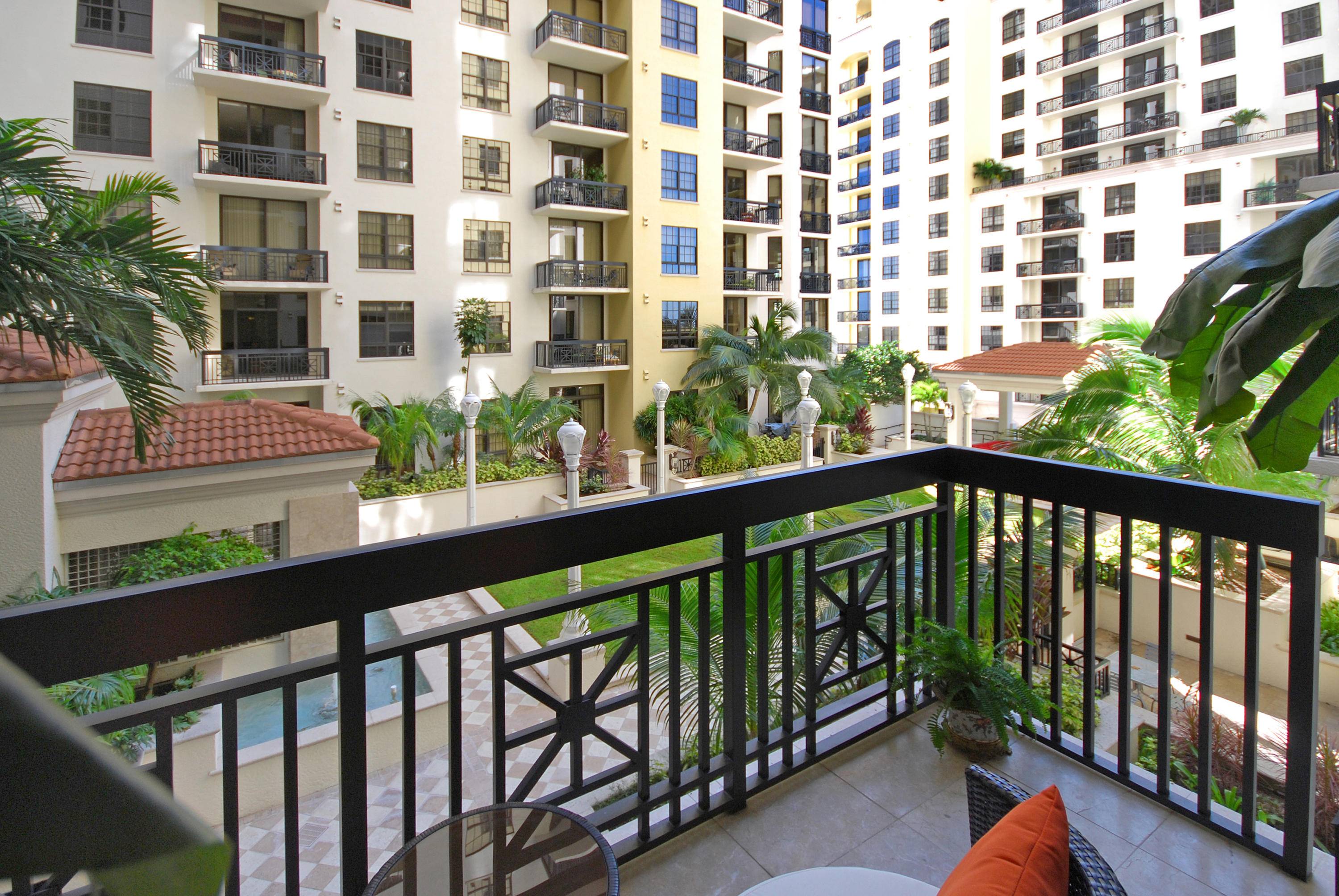 Wonderful downtown WPB courtyard and garden view unit overlooking the fountains and palm trees.