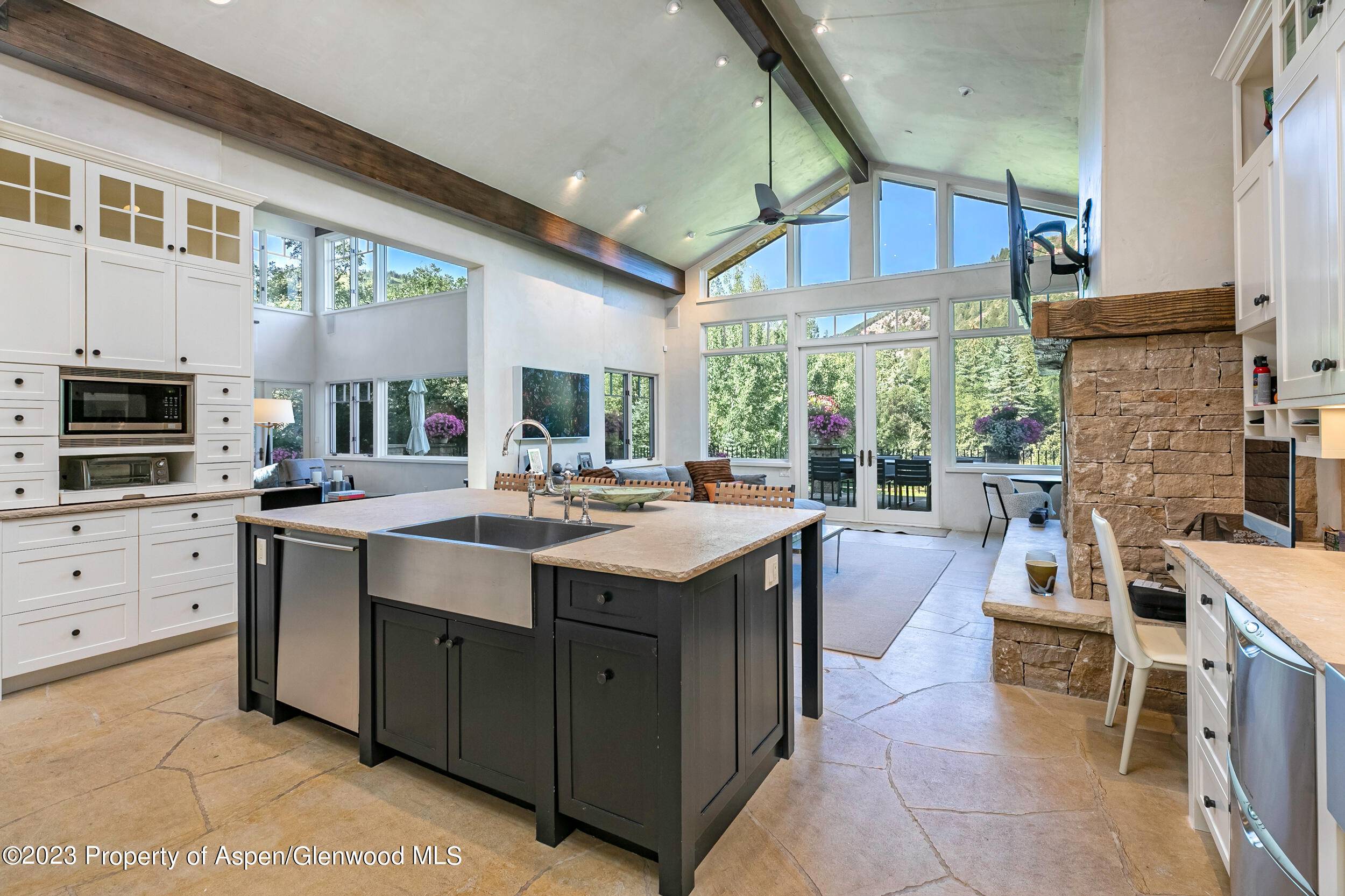 The Rocky Mountains meet the best of European design in this newly renovated six bedroom home in the exclusive and private area of Glen Eagle Drive.