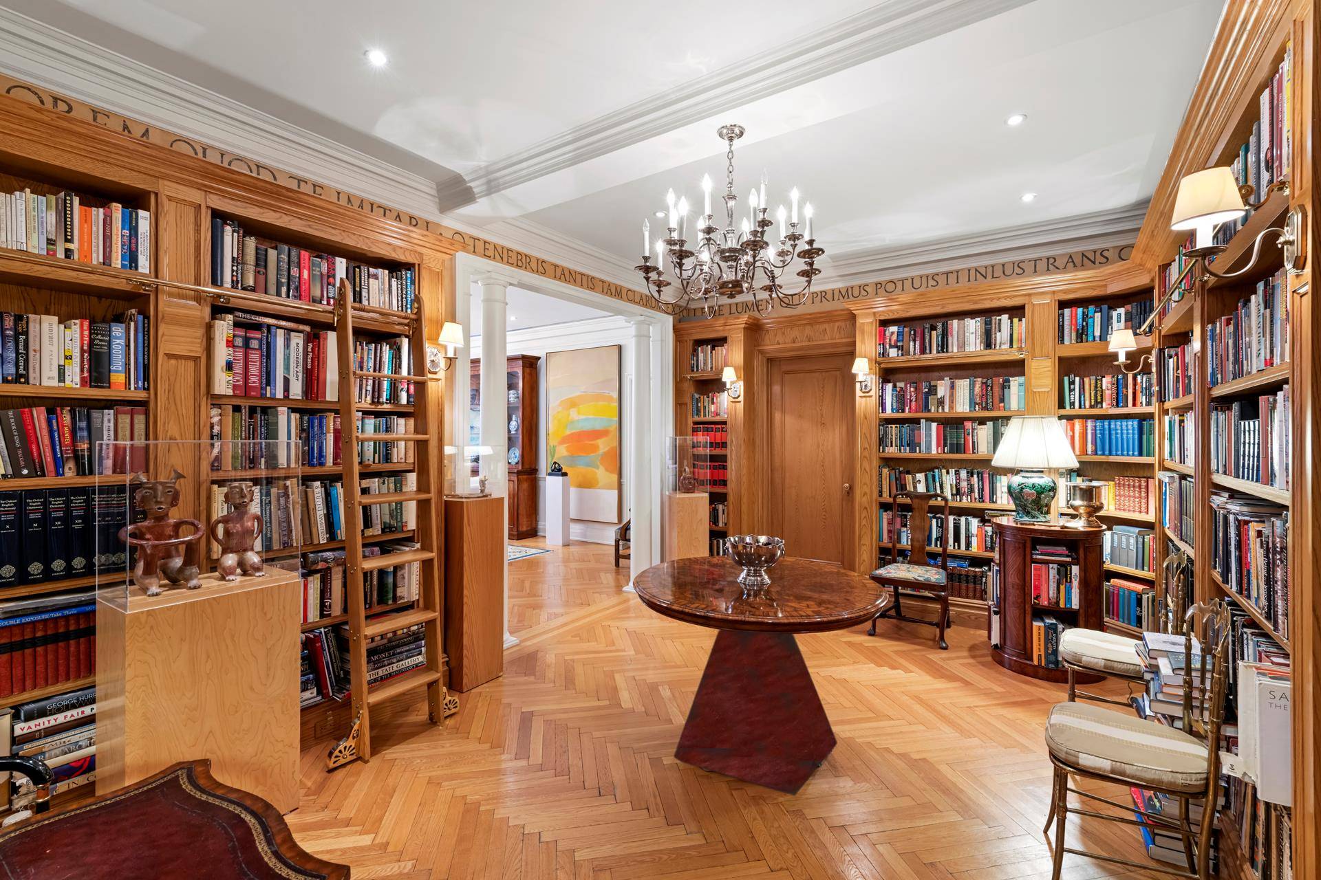 Grand and elegant classic 6 at the incomparable 480 Park Avenue Enter through the formal, book lined gallery which sets the tone for this inviting home.