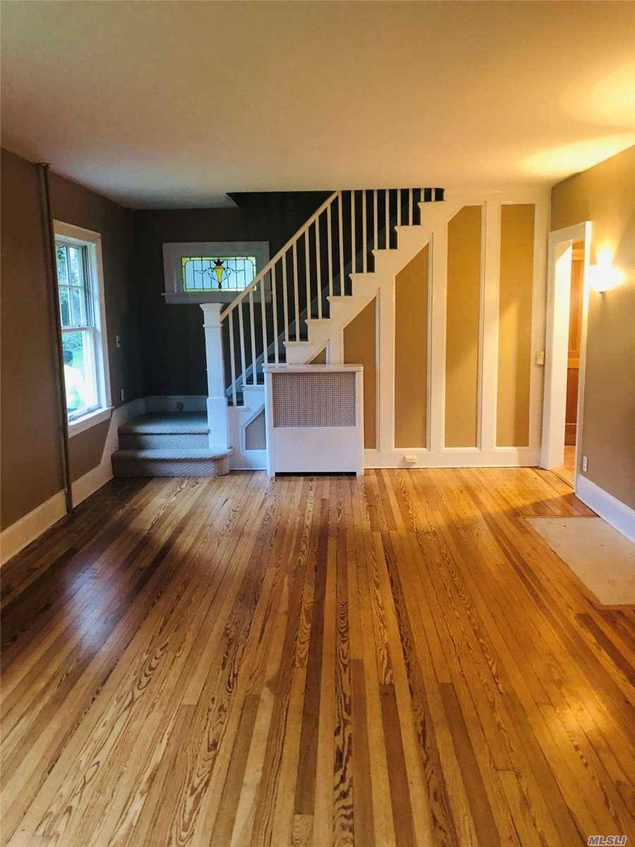 Beautiful Colonial On Over Sized Lot, Hardwood Floors Through Out 1st Floor, North Shore Schools With Glenwood Landing Elementary School, Large Basement For Storage As Well As Walk Up Attic.
