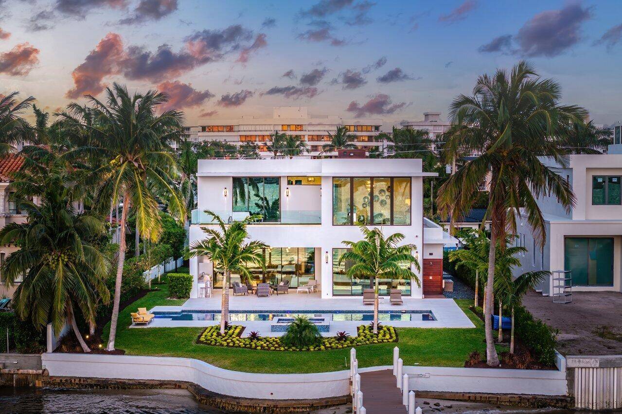 Introducing 807 N Atlantic Dr, a stunning ultra modern waterfront estate situated on exclusive Hypoluxo Island.