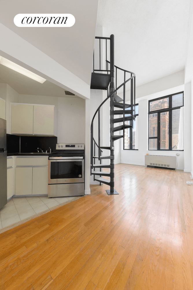 Welcome to your one bedroom loft on the Upper West Side, with a soaring 15 ft.